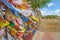 ELISTA, RUSSIA - 08/11/2019: Prayer scarves flutter on a fence in the territory of a Buddhist temple