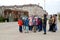 ELISTA, RUSSIA. School excursion group in the territory of the memorial complex Outcome and Return. Car museum of Stalin depor