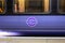 Elizabeth Line roundel sign on the side of a train