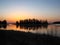 Elk Island National Park Sunset behind Wooded Island in Astotin Lake, Alberta, Canada