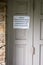 ELKINS PARK, PENNSYLVANIA - APRIL 14th, 2020: A Sign on a Door States All TCP Activities are Postponed Due to the Coronavirus