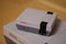 ELKINS PARK, PENNSYLVANIA - October 14, 2020: A Nintendo Entertainment System Classic Edition on Top of an Original Nintendo