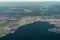 Elliot Bay Washington with aerial city view of landscape around Seattle Downtown and Seattle suburbs