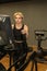 Elliptical trainer young training person, from female workout in running girl sportswear, screen elliptical. Cardio