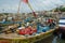 Elmina, Ghana - February 13, 2014: Colorful moored wooden fishing boats in African harbor town Elmina