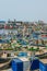 Elmina, Ghana - February 13, 2014: Colorful moored wooden fishing boats in African harbor town Elmina