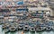 Elmina, Ghana - February 13, 2014: Colorful moored wooden fishing boats in African harbor town Elmina