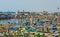 Elmina, Ghana - February 13, 2014: Colorful moored wooden fishing boats in African harbor town Elmina