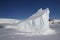 Elongated iceberg frozen in Antarctic islands winter