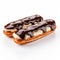 Elongated Manapunk Eclairs With Chocolate Icing On White Background