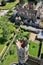 ELY, UK - MAY 26, 2017: Aerial view of the Bishop of Ely with a turret in the foreground - picture taken from the top of the West