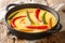 Ema Datshi Bhutanese Chili and Cheese Stew closeup in the pan. horizontal