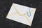 Email envelope icon with clip for attachments