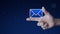 Email flat icon on finger over fantasy night sky and moon, Business contact us concept