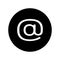 Email icon in black circle. E-mail symbol