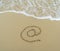 Email symbol draw on beach