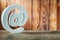 Email symbol on sunny vintage wood background