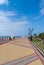 the embankment is covered with paving stones in the southern warm country on the background of blue sky