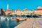 Embankment of the marina with boats in Adriatic Sea in Izola fishing town, Slovenia