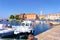 Embankment of the marina and boats in Adriatic Sea in Izola fishing village, Slovenia