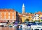 Embankment of the marina with boats in Adriatic Sea in Izola fishing village, Slovenia