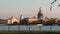 Embankment of the Neva river and the Admiralty, Isaac`s Cathedral and Palace Bridge in the evening in the summer