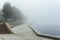 embankment and the river, foggy morning