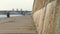 An Embankment And a Stone Wall at The Dnipro With a Bridge in the Background