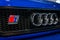 Emblem of an entry-level luxury car Audi RS 2 Avant, 1995.