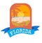 Emblem logo for vacation in Florida with sea and waves. Palm silhouette in orange colours.