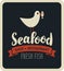 Emblem seafood with seagull with fish in its beak