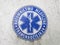 Emblem sign of round the clock emergency medical care in Poland, concept of an obsolete and ineffective medical system