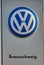 Emblem of the Volkswagen company on a sign at the entrance to the VW plant