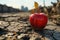 Emblematic apple on dry earth illustrates food insecurity, water shortage, agricultural crisis