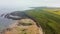 Embleton Bay and Burn beach with the ruins of Dunstanburgh Castle