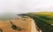 Embleton Bay and Burn sandy beach with the ruins of Dunstanburgh Castle