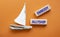 Embody Allyship symbol. Concept word Embody Allyship on wooden blocks. Beautiful orange background with boat. Business and Embody