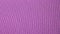 Embossed purple color texture. Geometric pattern on a colored surface.