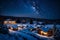 Embrace the magic of winter nights with an HD photograph capturing the glistening stars over a snowy landscape, creating a