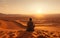 Embracing Solitude: Man Overlooks Sahara\\\'s Vast Expanse