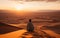 Embracing Solitude: Man Overlooks Sahara\\\'s Vast Expanse
