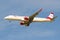 Embraer ERJ-195LR OE-LWM Austrian Airlines airplane close up in blue sky