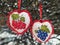 Embroidered hearts with viburnum and grap as Ukrainian symbols of man and woman (