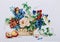 Embroidered picture, still life with flowers and fruits, cross-stitch on textile canvas