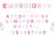 Embroidery font design in pastel colors. Isolated on white.