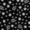 Embroidery white flowers and leaves on black background. Monochrome seamless pattern in vintage style