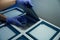 Embryologist places a petri dish with biomaterial in special box