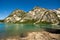 Emerald alpine lake Braies in Prags valley surrounded by Dolomites