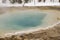 Emerald blue geyser at Fountain Paint Pots in Yellowstone Nation