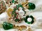 Emerald greeen white pearl gold rings and earing jewelry on white background